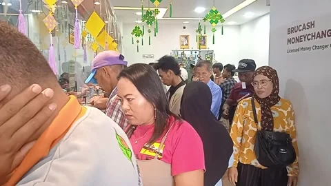 Video of a Group of Asians Queuing to Send Money at a Money Transfer Place Stock Footage 307315815