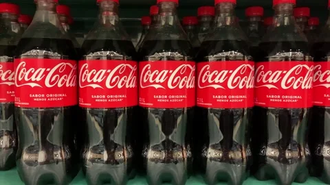 Video of a group of "Coca-Cola" soda bottles in a local market Stock Footage 256054405