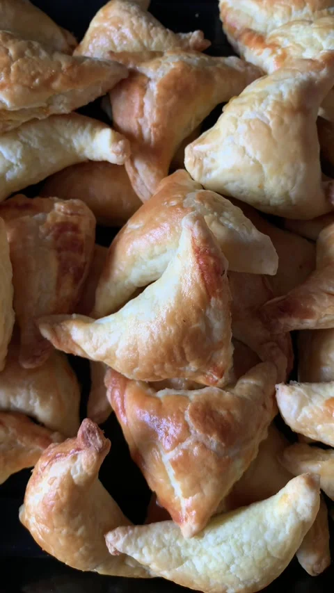 Video of group of small pies - snacks. Concept of food at events. Stock Footage 255627888