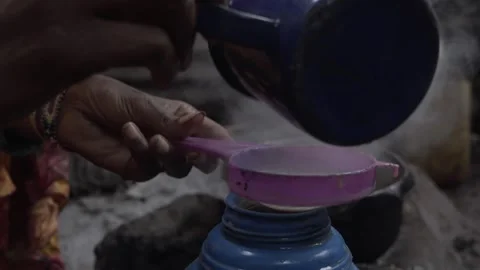 Video of Hand holding tea strainer as tea is poured into a thermos. Stock Footage 319989819