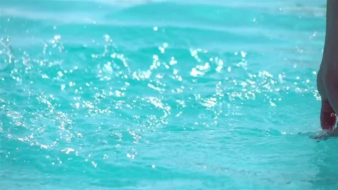 Video of hand splashing the water in real slow motion Stock Footage