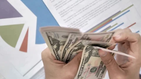 Video of hands counting cash of dollar US banknotes. Concept of investment,.. Stock Footage 266474209