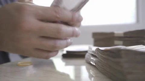 Video of hands counting cash of dollar US banknotes. Concept of investment, Stock-Footage 336263763