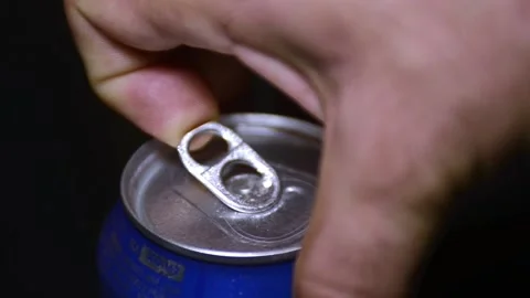 Video of hands opening a blue can of cola Stock-Footage 141705989