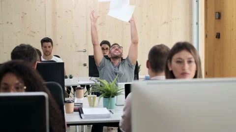 Video of happy handsome man throwing invoices and documents on the air while  Stock Footage 162966635