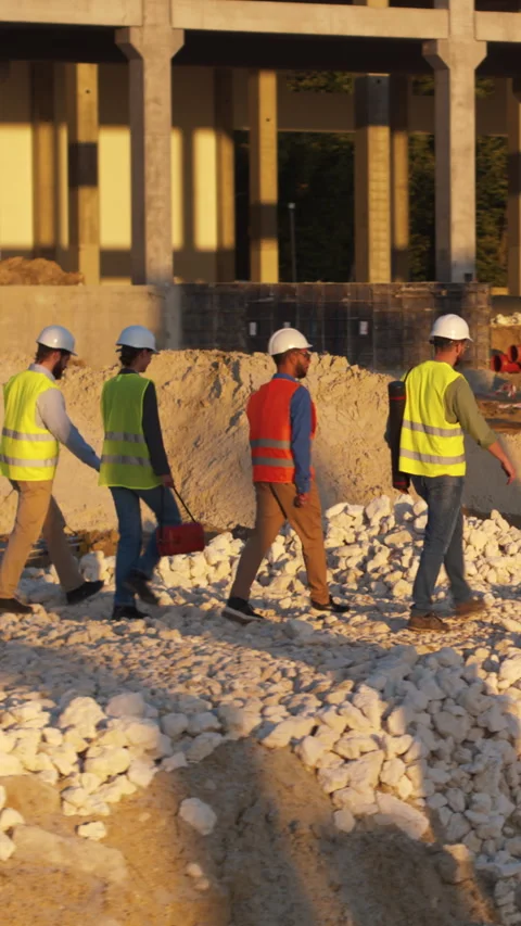A video highlights a day in construction workers tasks and teamwork Stock Footage 319613110