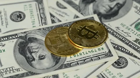 Video of hundred dollar bills with bitcoin coins Stock Footage 314012066
