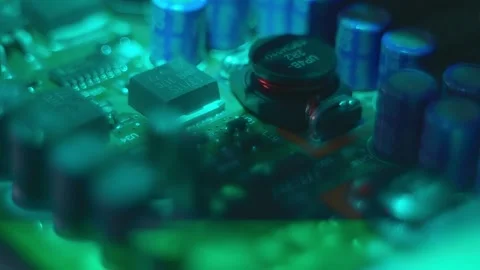 The video image is projected on printed circuit board with electronic component Stock Footage 313157308