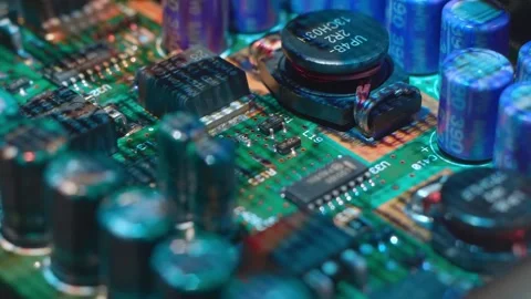 The video image is projected on printed circuit board with electronic component Stock Footage 313179618