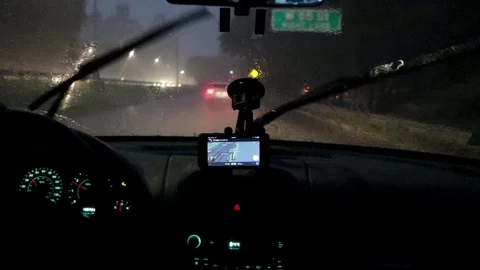 Video from inside a car driving through a heavy rain storm 動画素材 95391222