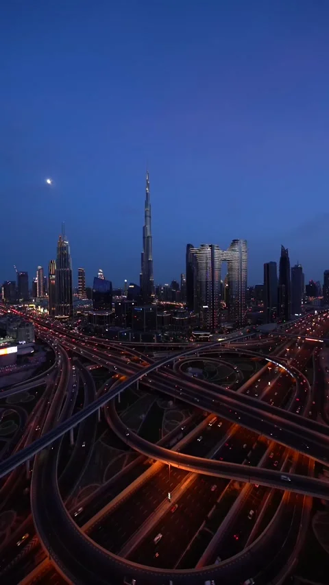 Video of an intersection on Sheikh Zayed Road in the evening Stock Footage 239069665