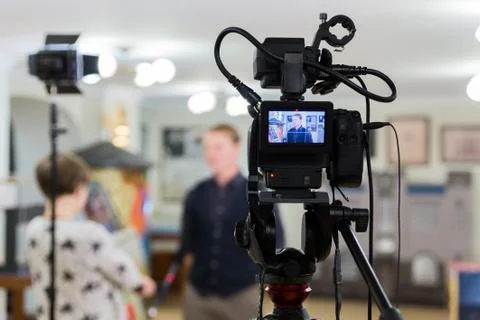 Video of the interview. Television equipment, camcorder with LCD screen Stock Photos