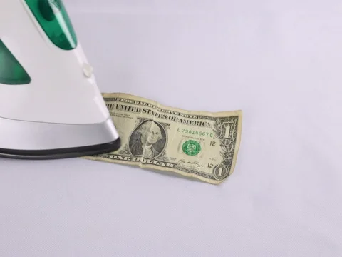 Video of ironing money Stock Footage