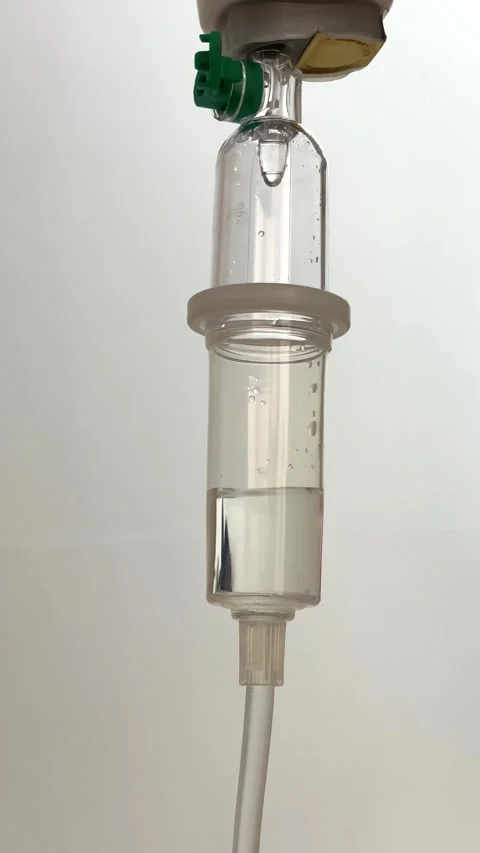 Video of IV fluid infusion set inside a hospital room. Stock Footage 297966573