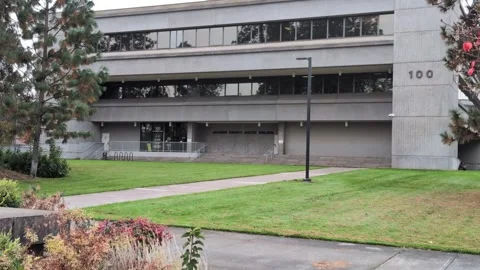 Video of the Jackson County Justice Building shows layered gray architecture Stock Footage 323680812
