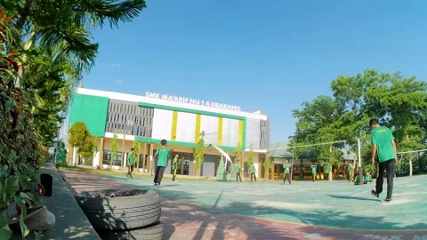 Video lapse when high school students were playing volleyball 스톡 동영상 243013462