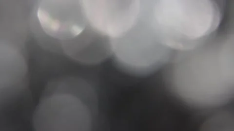 Video of large bokeh light leak reflections side by side seamless 動画素材 318059136