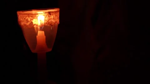 Video of lighted candles in a pilgrimage of a religious festival Stock Footage 232399575