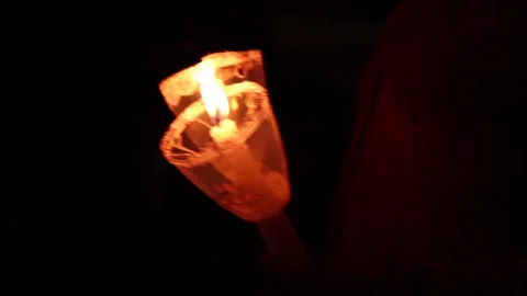 Video of lighted candles in a pilgrimage of a religious festival. Stock Footage 232399582