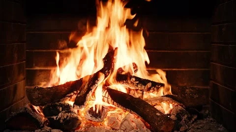 Video of lit fireplace at night Stock Footage 340827942