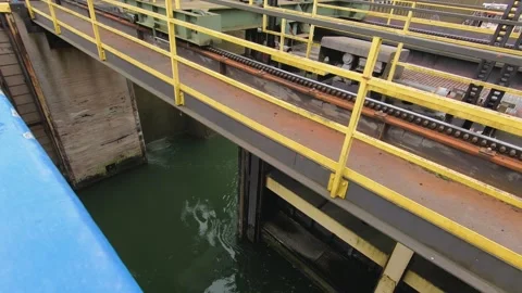 Video of a lock system on a canal, showcasing industrial waterways and infrastru Stock Footage 287953768
