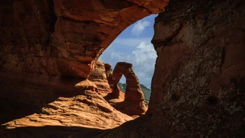 Video loop time lapse of clouds moving. Delicate Arch in Arches National Park Stock Footage 346254437