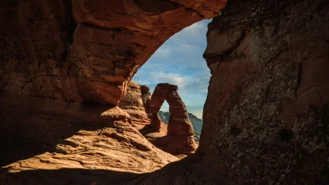 Video loop time lapse of clouds moving. Delicate Arch in Arches National Park Stock Footage 346254449