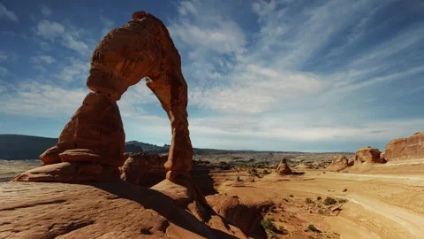 Video loop time lapse of clouds moving. Delicate Arch in Arches National Park Stock Footage 346254488