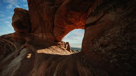 Video loop time lapse of clouds moving. Delicate Arch in Arches National Park Stock Footage 346549776