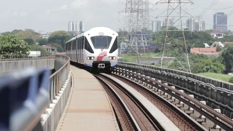 Video of the LRT (train) passing by the camera 動画素材 138070438