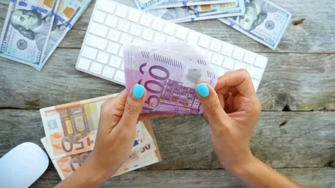 VIDEO, make money online with woman counting euro Stock Footage