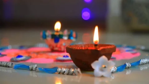 Video of making Rangoli and lighting a diya on Diwali Stock-Footage 218750779
