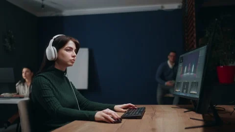 Video making studio, post-production processes, woman work with computer, final Stock Footage 233722236