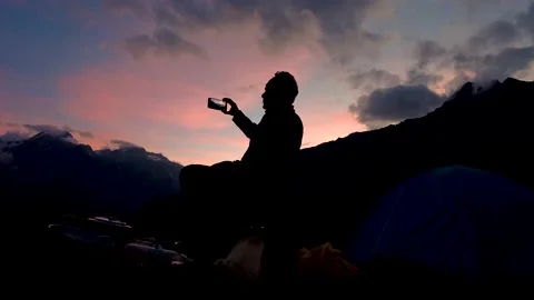 A Video of a Man Capturing the Beautiful Nature in Phone near Ghepan Lake Stock Footage 233269800