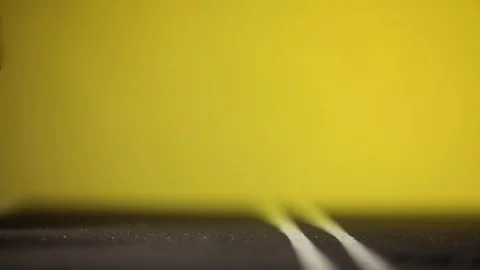 Video of a man standing next to his amazing, broken, yellow, new car figurine Stock Footage 113242574