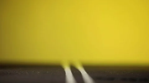 Video of a man standing next to his amazing, yellow car figurine in the middl Stock Footage 113243096