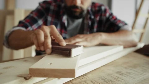 Video of man using sandpaper for cleaning the board. Video stock 137087283