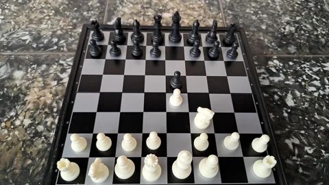 Video of a man's hand demonstrating a chess move. Stock Footage 255661196