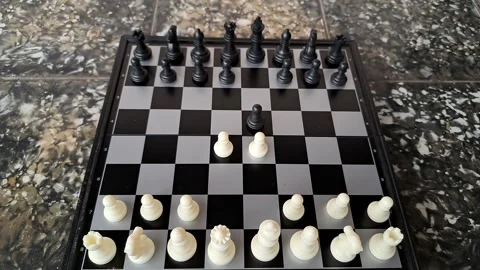 Video of a man's hand demonstrating a chess move. Stock Footage 255661229
