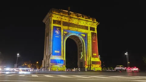 Video mapping with lights on the Arch of Triumph facade. Bucharest, Romania. Video stock 219543660