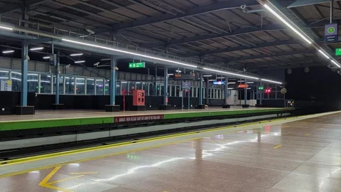 A video of metro train arriving in empty metro station platform with no cro.. Stock Footage 335873730