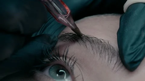 Video of microblading work. Permanent makeup on the brow forthe young woman. Video stock 223160804