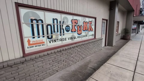 Video of the "Monk to Funk Vintage Vinyl Records" storefront sign Stock Footage 339984853