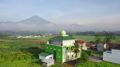 Video of a mosque with a mountain background with drone Stock Footage 292837095