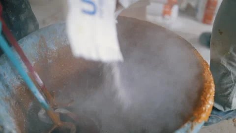 Video in motion with a worker mixing colored polyurethane mortar with epoxy r Stock Footage 161702635