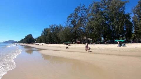 The Video moves from left to the right side of tourists on the Sandy beaches Stock Footage 132267979