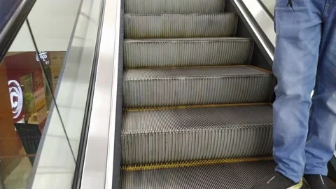 A video of a moving escalator. Stock Footage 147871963