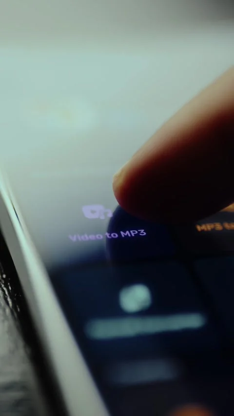 Video to MP3 function displayed on mobile phone screen Stock Footage 326947299