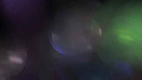 Video of multi-colored bokeh in the dark Stock Footage 318366358