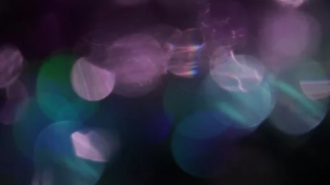 Video of multi-colored crystal light leaks in the dark Stockbeeldmateriaal 317493321